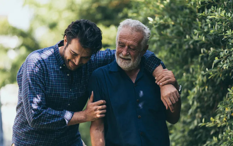Father and son walking