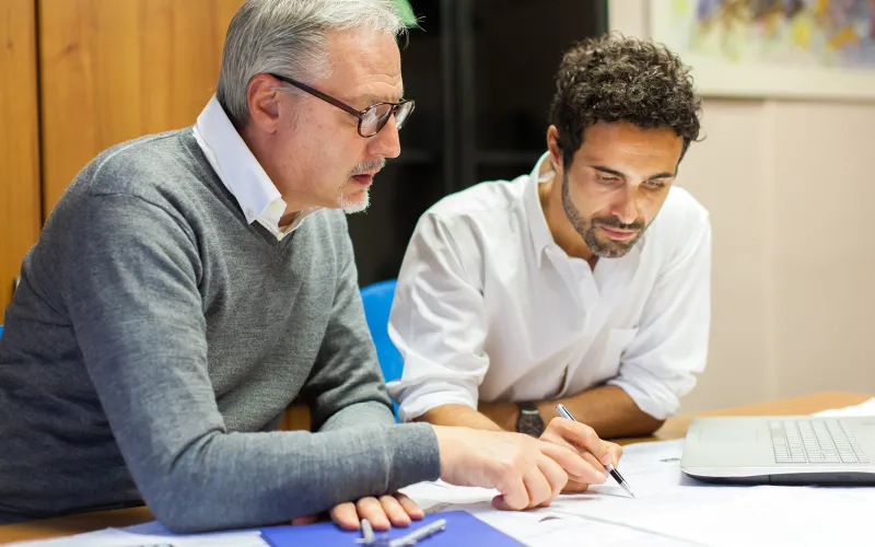 Business owner discussing implications of selling their business 