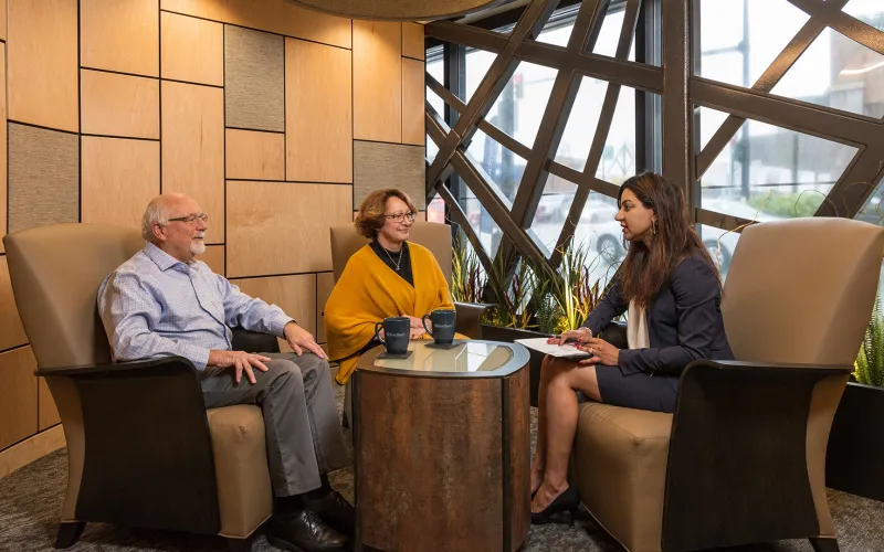 Older couple meeting with financial advisor