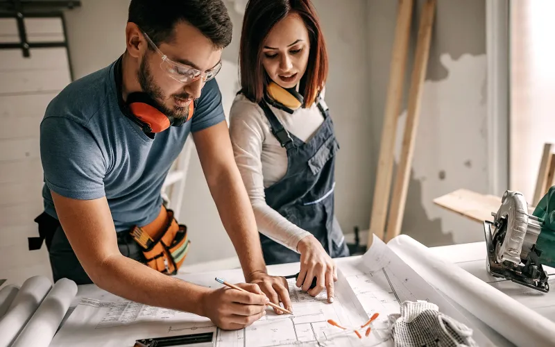 Couple working on renovation plans