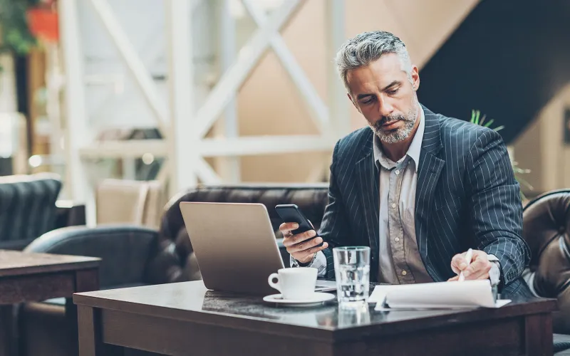 Business man on smartphone