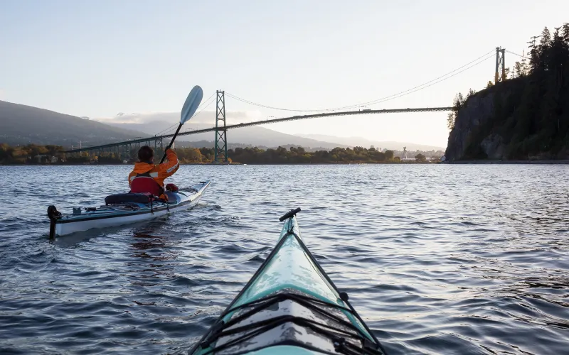 Kayakers under Lions Gate Bridge