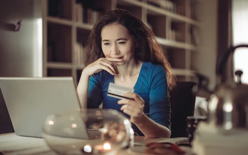 Woman at home on laptop 