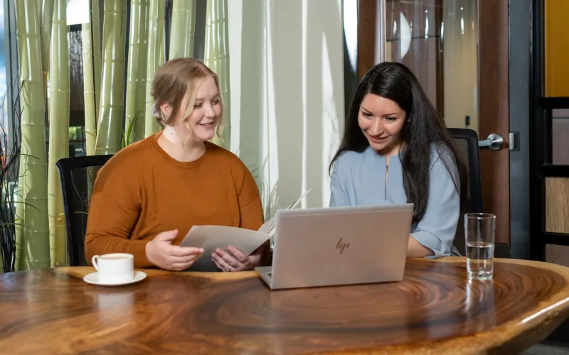 BlueShore advisor and client in boardroom