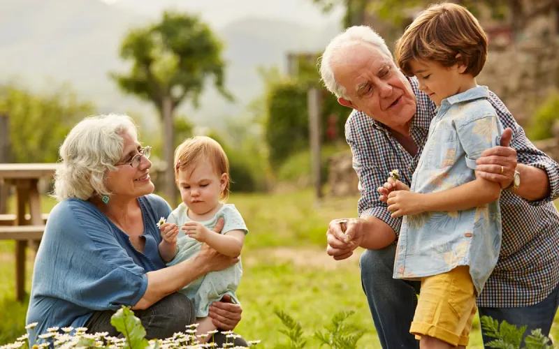 Grandparents playing with their grandchildren