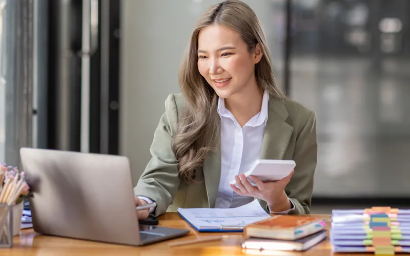 A woman working on her laptop