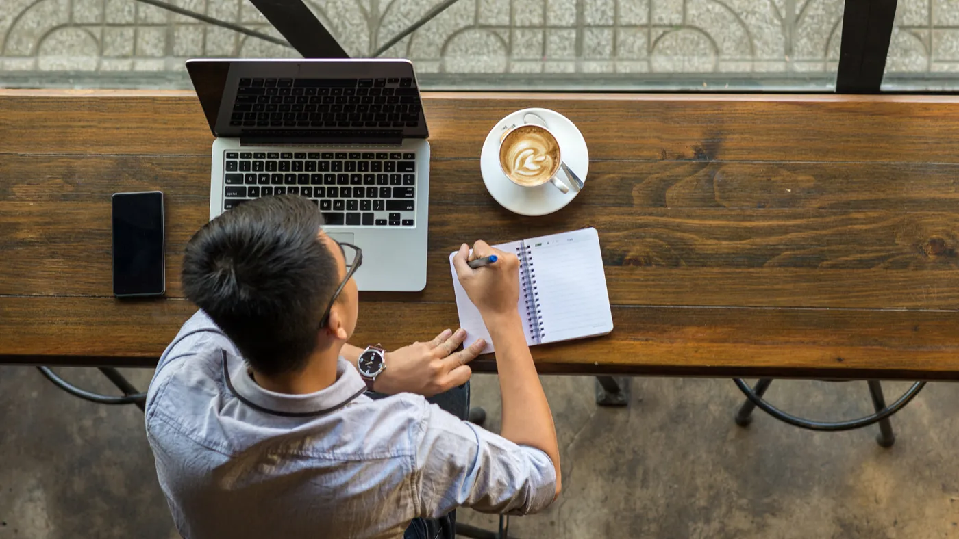 Man working on his RRSP plan on a computer