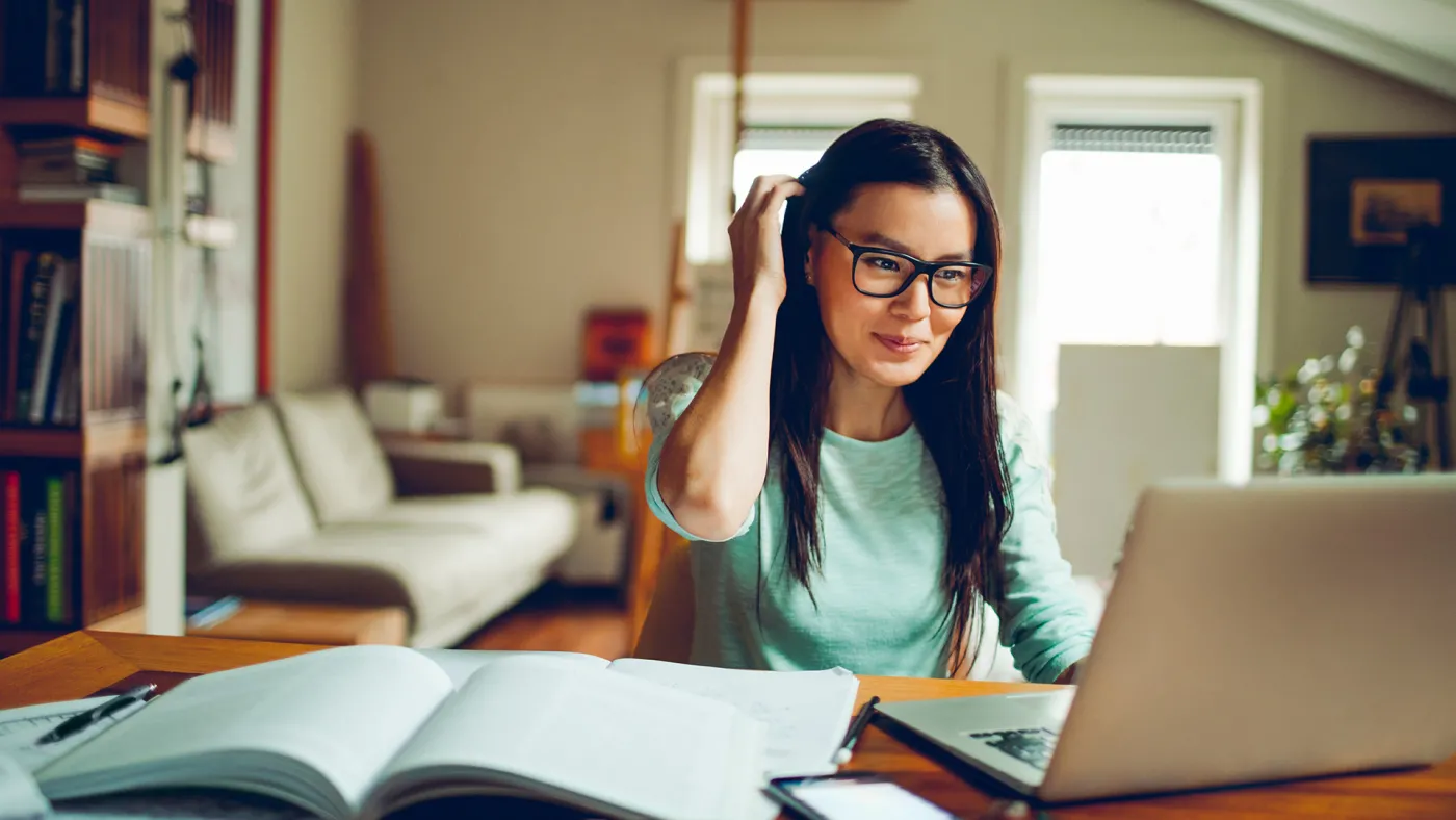 Woman working on her financial plan on a computer