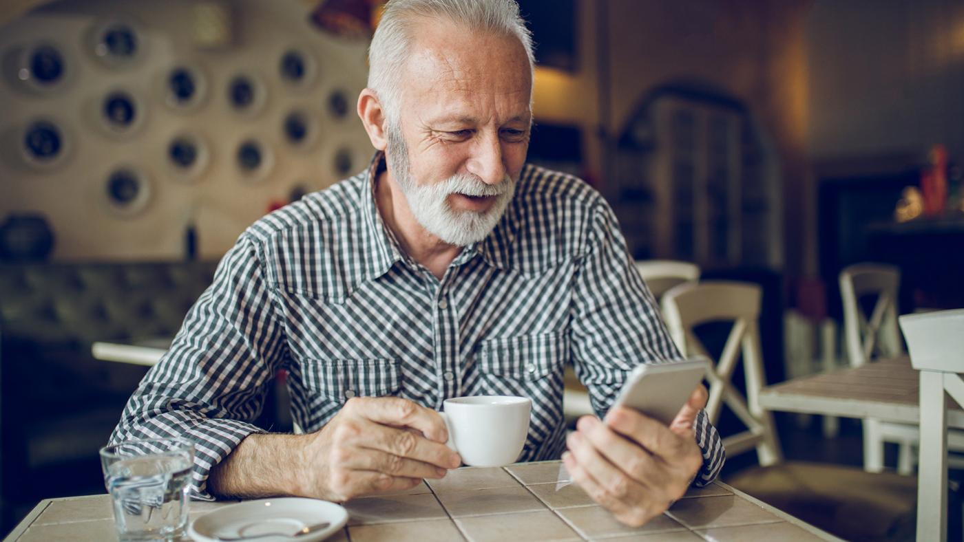 Older man on smartphone