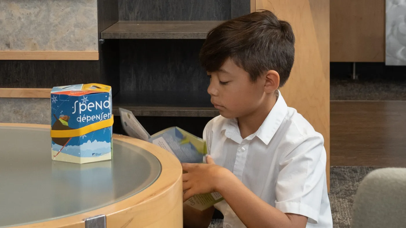 Child reading about Wishbank