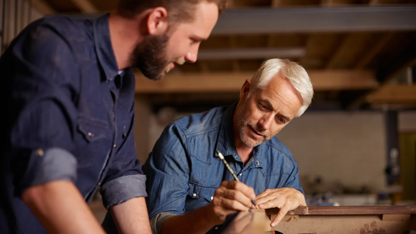 Men working on project