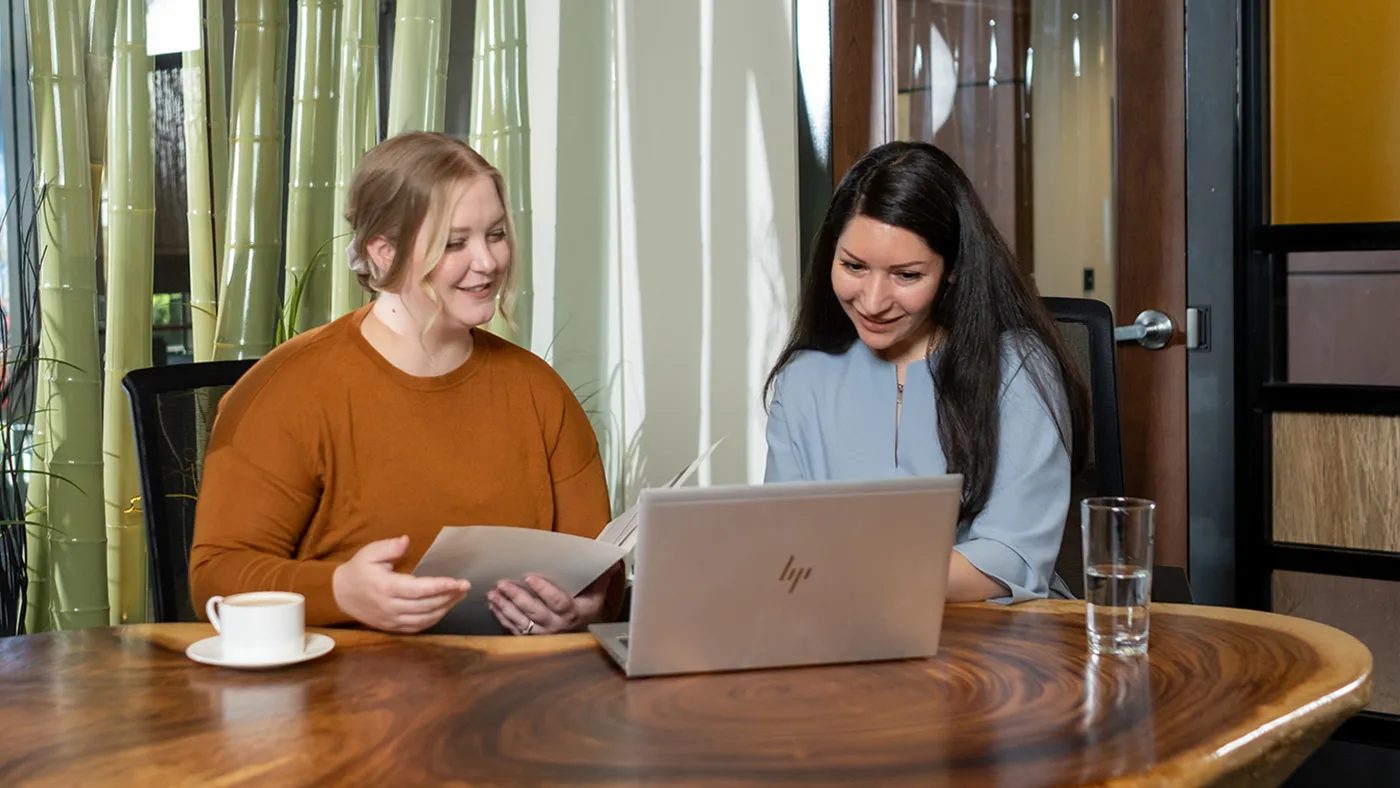 Woman meeting with business advisor