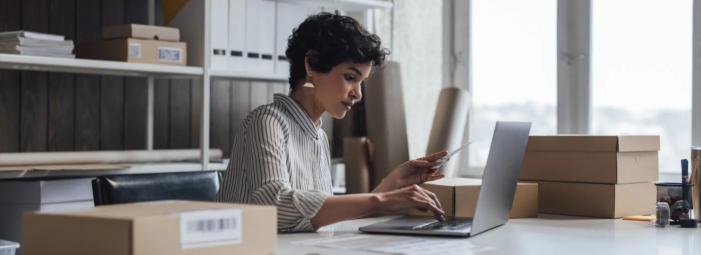 Woman typing on laptop