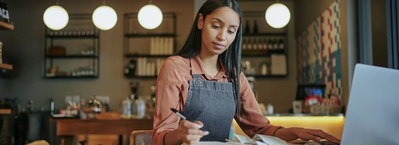 Women looking at her finances at home