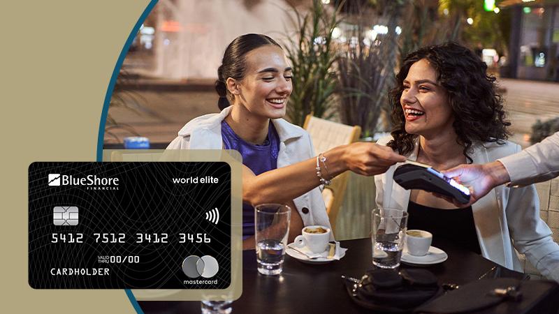 Ladies paying for coffee on patio using mastercard