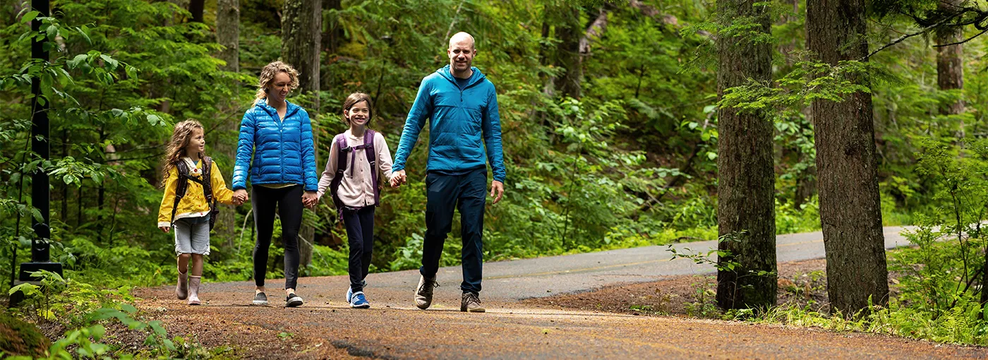 Family out for a walk in a forest