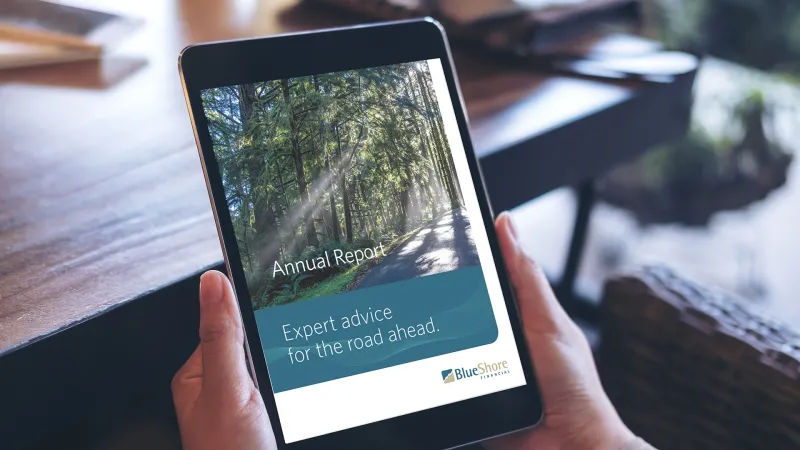 Person reading BlueShore's annual report