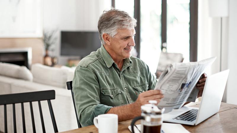 Man reading the financial news