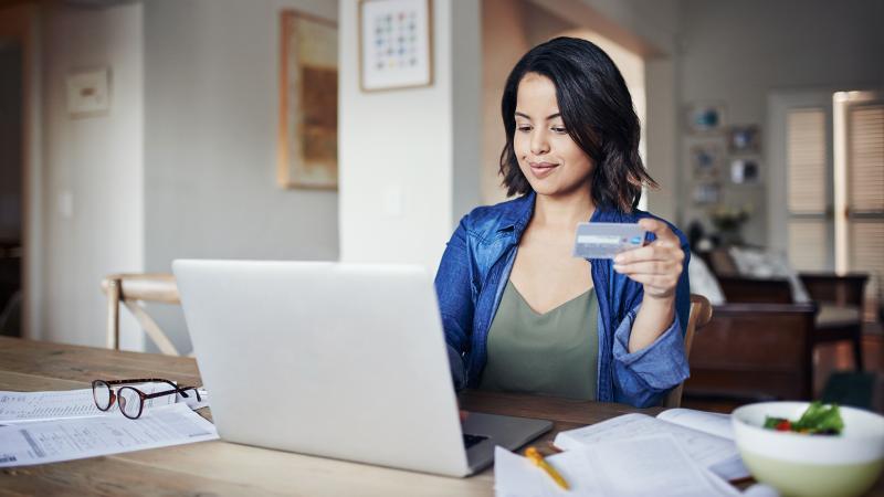 Woman researching credit cards online