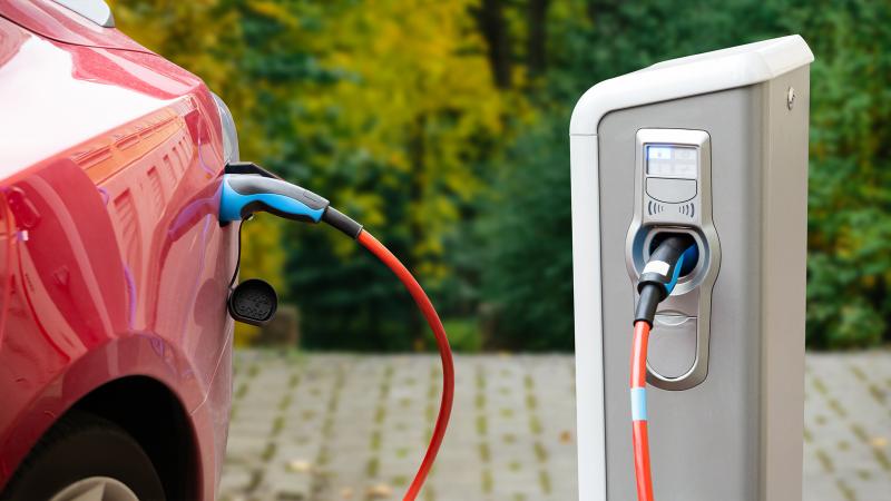 Electric car charging outside