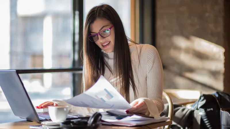 Business woman working on her laptop