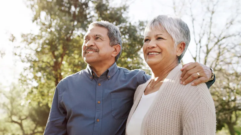 Retired couple embracing